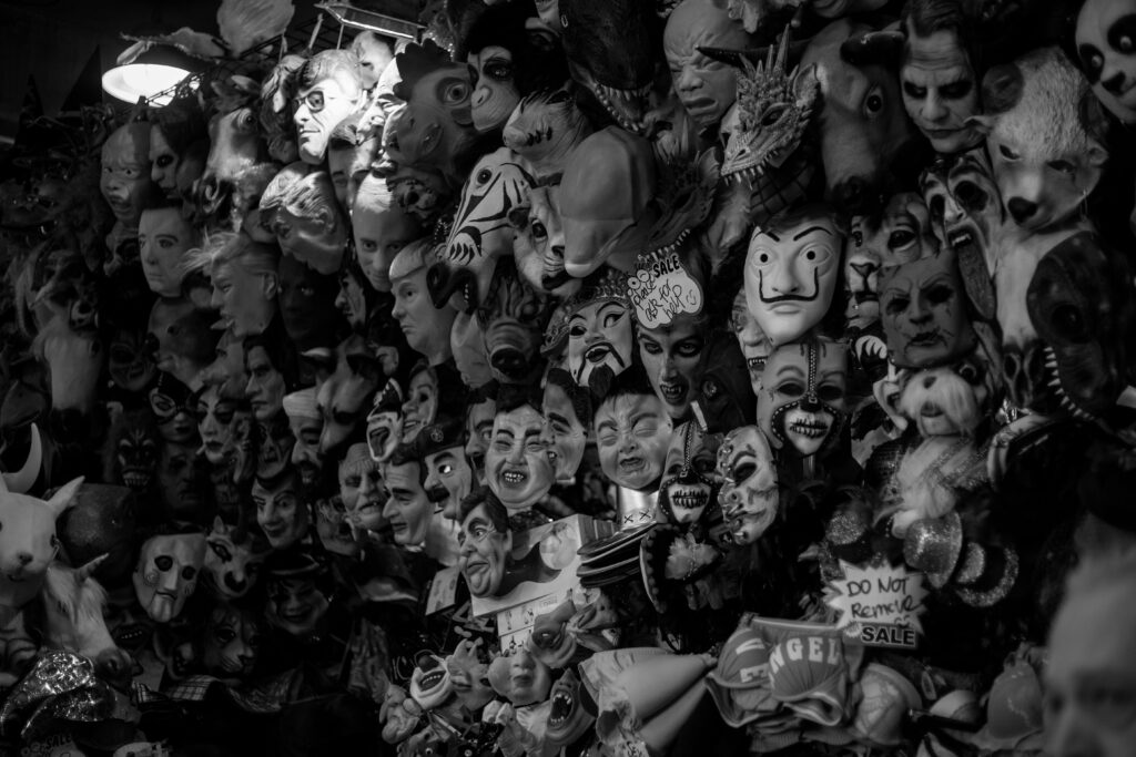 The Greenbrier Ghost A haunting black and white photo of a collection of eerie masks, perfect for Halloween themes.